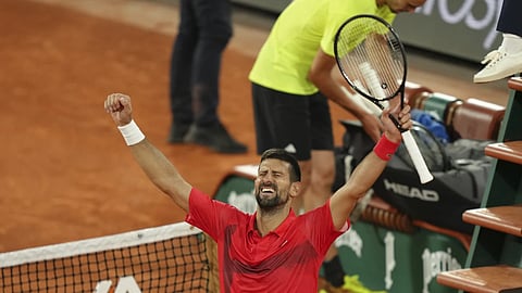 Serbia's Novak Djokovic celebrates as he won the quarterfinal match of the French Tennis Open against Germany's Alexander Zverev at the Rolland-Garros stadium in Paris, Wednesday, June 4, 2025.