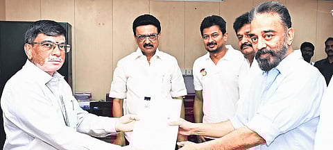 MNM founder Kamal Haasan filing nomination on Friday as CM MK Stalin and Deputy CM Udhayanidhi Stalin look on 