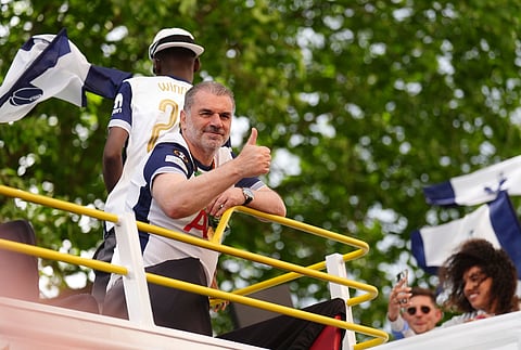 Tottenham Hotspur manager Ange Postecoglou on the open-top team bus during the Europa League winners parade (Photo | AP)