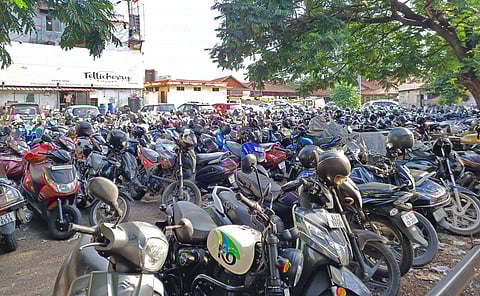Steep hike in parking fees at railway station, bus stand leaves commuters frustrated