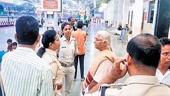 Medha Patkar (R) was stopped by police at Rayagada railway station.