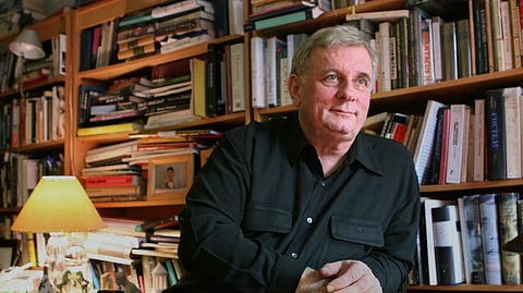 Author Edmund White appears in his New York apartment on April 24, 2006.