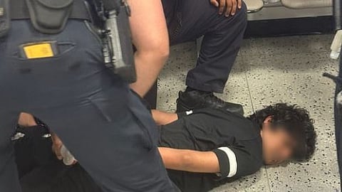 The Indian youth was handcuffed and pinned to the ground at USA's Newark Airport.