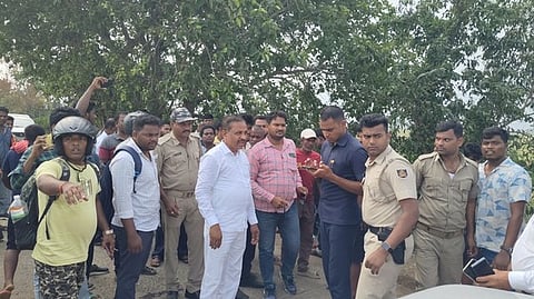 Transport minister Bibhuti Bhushan Jena shifts an accident victim to a hospital in his escort vehicle