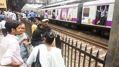Panic stricken people at Mumbra Railway Station after several passengers reportedly fell from a moving train on June 9, 2025.
