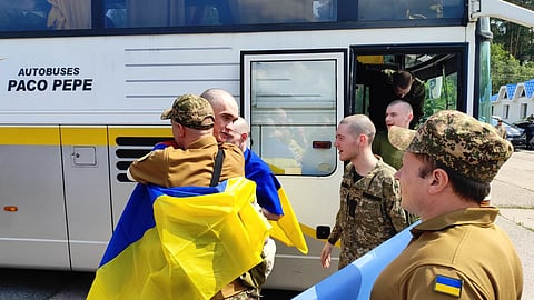 Ukrainian President Volodymyr Zelensky posted images of soldiers draped in Ukrainian flags, cheering and hugging.