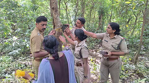 Forest department officials set up the surveillance cameras in forested areas.