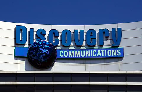 The Discovery Communications logo atop its headquarters in Silver Spring.