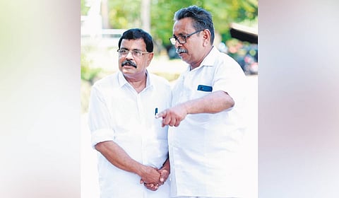 NDA’s Mohan George (left) campaigning at Pulliyod in Nilambur.