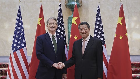 In this photo from June 9, 2025, Chinese Vice Premier He Lifeng, right, shakes hands with US Treasury Secretary Scott Bessent before their meeting to discuss China-US trade in London.