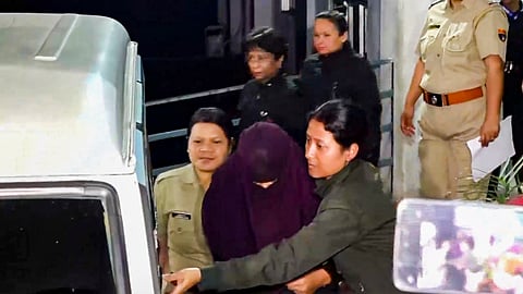  Police escort Sonam Raghuvanshi, accused in the alleged murder of her husband Raja Raghuvanshi during their honeymoon in Meghalaya, after her medical check-up at Ganesh Das Hospital, in Shillong, Wednesday, June 11, 2025.