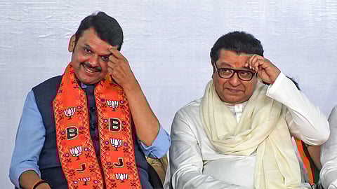 In this photo from May 18, 2024, then-Maharashtra Deputy Chief Minister Devendra Fadnavis shares the stage with Maharashtra Navnirman Sena (MNS) chief Raj Thackeray during the public meeting at Shivaji Park, in Mumbai. 