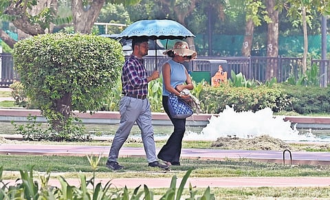 Amid soaring temperature, people seen out at Kartavya Path on Thursday