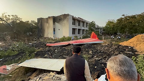 Civil Aviation Minister Ram Mohan Naidu arrives at the crash site to take stock of the situation following the Air India plane crash, in Ahmedabad, Thursday, June 12, 2025.