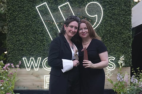 Dutch writer Yael van der Wouden, winner of the Women’s Prize for Fiction for her book "The Safekeep," left, and British physician Rachel Clarke, winner of the Women's Prize for Nonfiction for her book, "The Story of a Heart," pose for the media in London, Thursday, June 12, 2025.