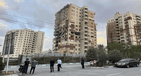Israel attacked Iran's capital early Friday, with explosions booming across Tehran, on Friday, June 13, 2025.