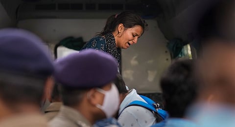 Relative of a victim of the Air India plane crash mourns outside a hospital, in Ahmedabad, Friday, June 13, 2025. A London-bound Air India plane carrying 242 passengers crashed moments after taking off from the Ahmedabad airport on Thursday.