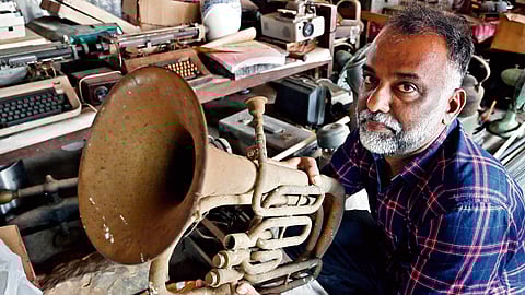 Abey with a trumpet he inherited from his grandfather’s collection