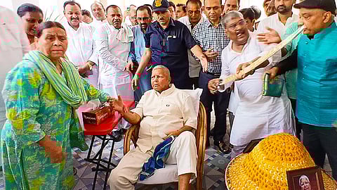 Lalu Prasad faces backlash over viral video showing Ambedkar portrait near his feet in Bihar