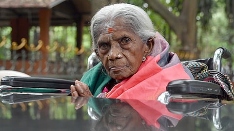The chapter titled Pro-Social Movements of Karnataka carries a detailed profile of Saalumarada Thimmakka under the subsection Environmental movements.