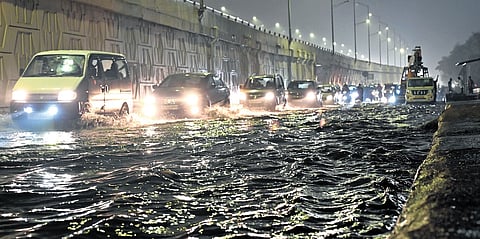 Waterlogging at Vinod Nagar causes traffic snarls after rainfall.