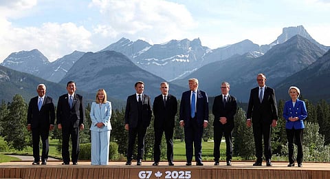 European Council President Antonio Costa, from left, Japan's Prime Minister Shigeru Ishiba, Italian Prime Minister Giorgia Meloni, French President Emmanuel Macron, Canada's Prime Minister Mark Carney, U.S. President Donald Trump, Britain's Prime Minister Keir Starmer, German Chancellor Friedrich Merz and European Commission President Ursula von der Leyen pose for a family photo during the G7 Summit, in Kananaskis, Alberta, Monday, June 16, 2025.
