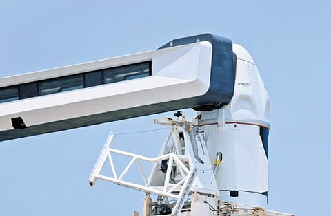 A file photo of the SpaceX Falcon 9 rocket and Dragon spacecraft