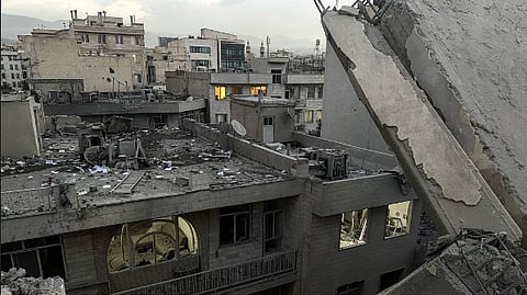 Debris and rubble are pictured at the scene of a building that was hit by an Israeli strike in Tehran on June 13, 2025. Israel hit about 100 targets in Iran on June 13, including nuclear facilities and military command centres and killing senior figures including the armed forces chief and top nuclear scientists.