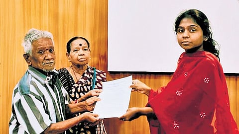 Jammalamadugu RDO A Sai Sree gives annulled gift deed to M Mohan Rao and his wife at Proddatur 