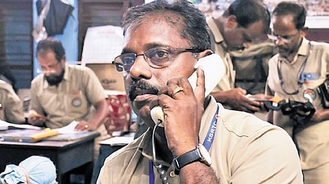 An official attending to a phone call at the SM office of Ernakulam KSRTC depot 