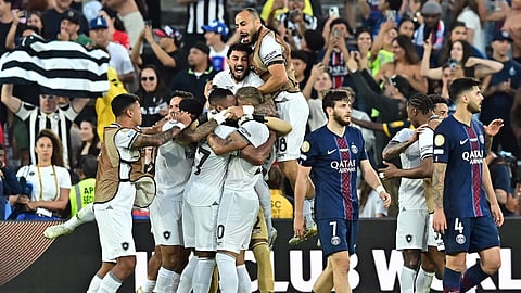 Botafogo players celebrate after winning the FIFA Club World Cup 2025 Group B football match between France's PSG and Brazil's Botafogo on June 19, 2025. 