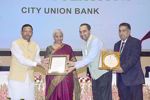 Dr N.Kamakodi, Managing Director and Chief Executive Officer of City Union Bank, receives Digital Payments Award from Union Finance Minister, Nirmala Sitharaman.