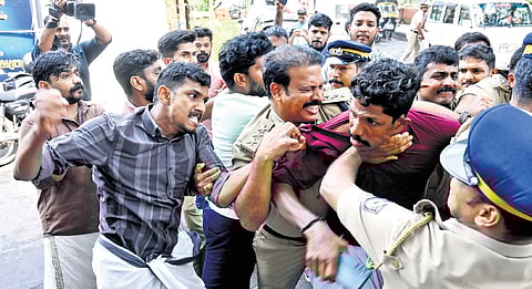 SFI workers clash with Yuva Morcha workers in Kozhikode on Saturday