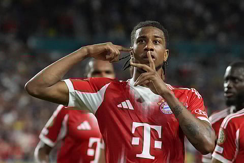 Bayern Munich's Michael Olise celebrates scoring his side's 2nd goal during the Club World Cup Group C soccer match between Bayern Munich and Boca JuniorsFriday, June 20, 2025.