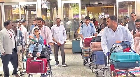 Evacuees from Iran arrive at the Kempegowda International Airport in Bengaluru on Sunday.