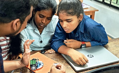 Students engaged in science demonstration activities as part of Collector’s ‘Super 100’ scheme