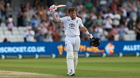 England's Ollie Pope celebrates his century on day two of the first cricket test match between England and India at Headingley cricket ground in Leeds, northern England on June 21, 2025.