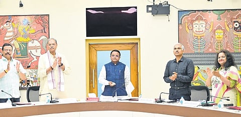 CM Mohan Majhi launching e-Registration app in the presence of Dy CM KV Singh Deo, Revenue minister Suresh Pujari and others.