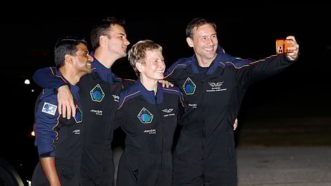 SpaceX Falcon 9 crew pose for a selfie before departing for a launch to the International Space Station at the Kennedy Space Center in Cape Canaveral, Fla., Tuesday, June 24, 2025.
