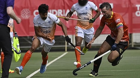 Indian men's hockey team captain Harmanpreet Singh and with coach Craig Fulton