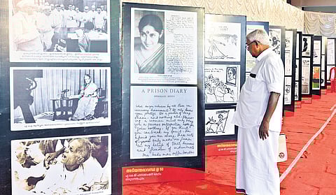 A man watching the exhibition organised at the AKG Centre as part of the 50th anniversary observance of Emergency 