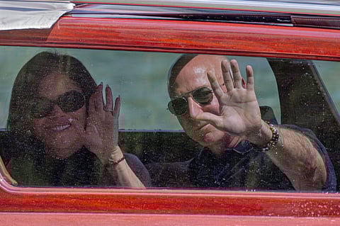 Bezos and Sanchez arrive in Venice as protesters say their wedding highlights wealth inequality