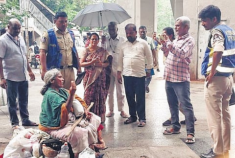 Police and GHMC officials interact with beggars during the special drive
