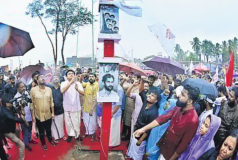 Public Works Minister Mohamed Riyas, who is also chairman of the reception committee, hoisting the conference flag of the four-day event  