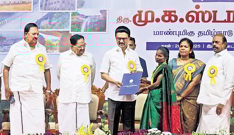 CM Stalin seen distributing welfare aid.