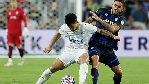 Al-Hilal's Marcos Leonardo, left, and Pachuca's Agustin Palavecino fight for the ball during the Club World Cup Group H soccer match between Al Hilal and CF Pachuca on June 26, 2025. 