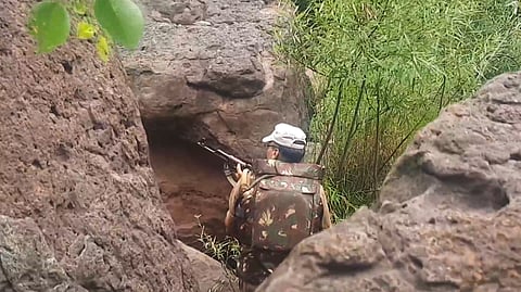  A security personnel during a search operation after an encounter broke out between security forces and terrorists in a remote forested area, in Jammu and Kashmirs Udhampur district, Thursday, June 26, 2025