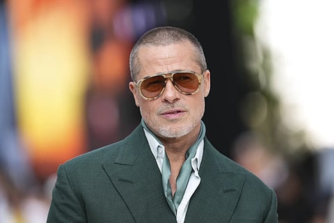 Brad Pitt poses for photographers upon arrival at the premiere of the film 'F1 The Movie' on Monday, June 23, 2025, in London.