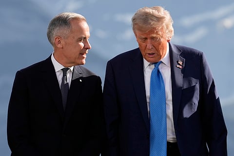 Canada Prime Minister Mark Carney (L) and US President Donald Trump