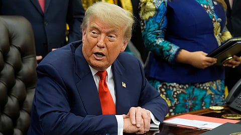 US President Donald Trump speaks to the media from the Oval Office of the White House in Washington.
